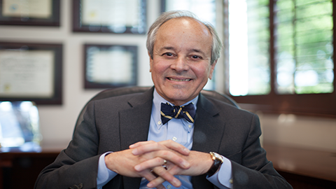 aurelio fernandez smiling in office