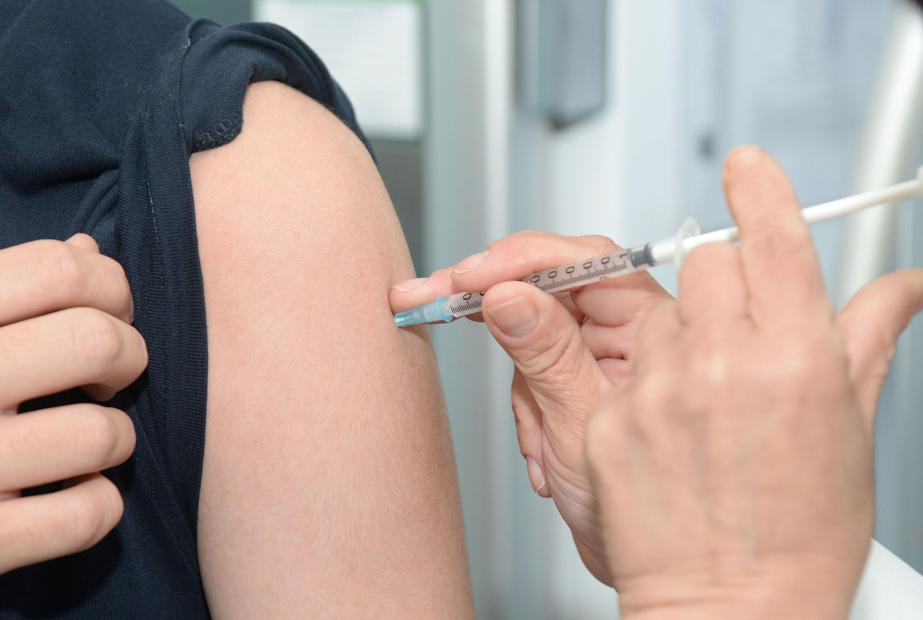 arm injection vaccination