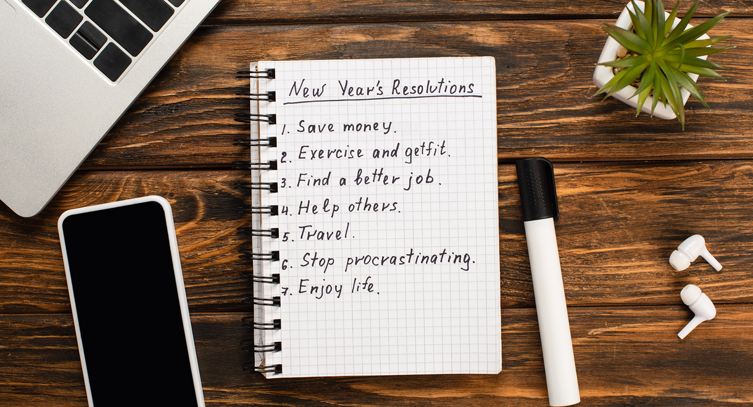 new year's resolutions written on pad