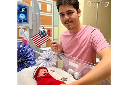 NICU baby and dad July 4
