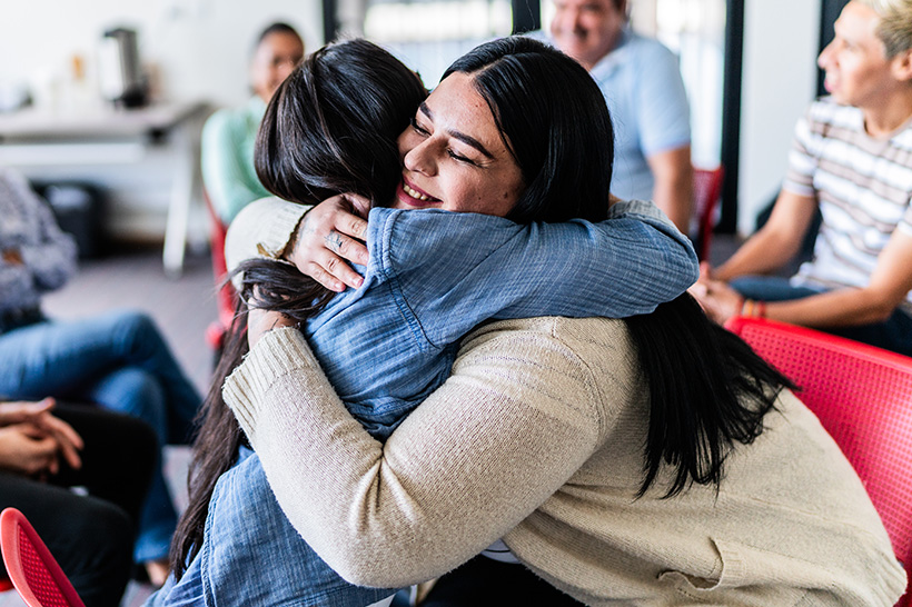 Women hugging