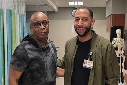 Burley with Memorial staff