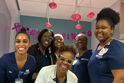 Jenelle with cancer care team at Memorial Cancer Institute
